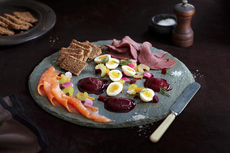 Scandinavian Appetiser Platter With Smoked Salmon, Beetroot Pure, Rye Bread, Boiled Eggs And Cold Beef Slices Photograph by Charlotte Tolhurst