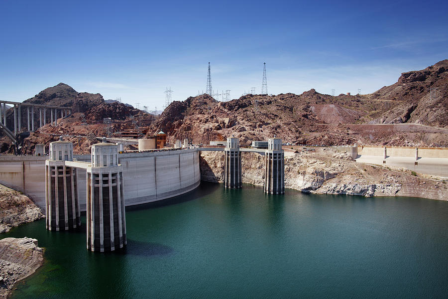 Nature Photograph - Scenic View Of Hoover Dam Against Blue Sky by Cavan Images