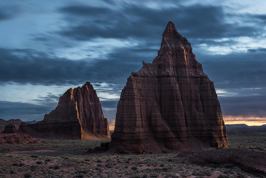 Capitol Reef National Park Photograph - Scenic View Of Rock Formations At Capitol Reef National Park Against Cloudy Sky During Sunset by Cavan Images