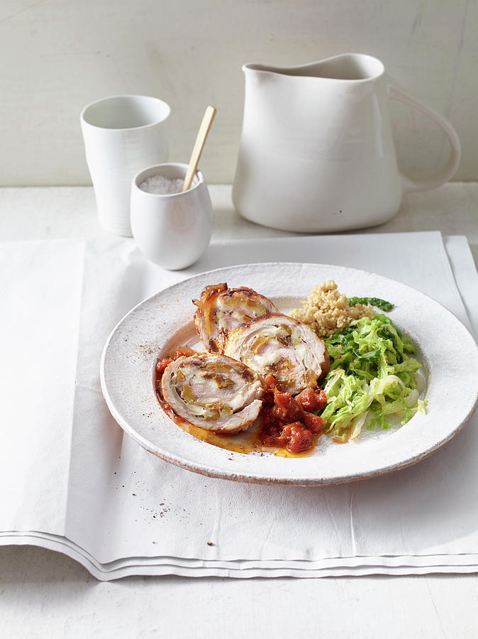Schnitzel Rolls With Spicy Halloumi Filling And Savoy Cabbage Photograph by Jan-peter Westermann