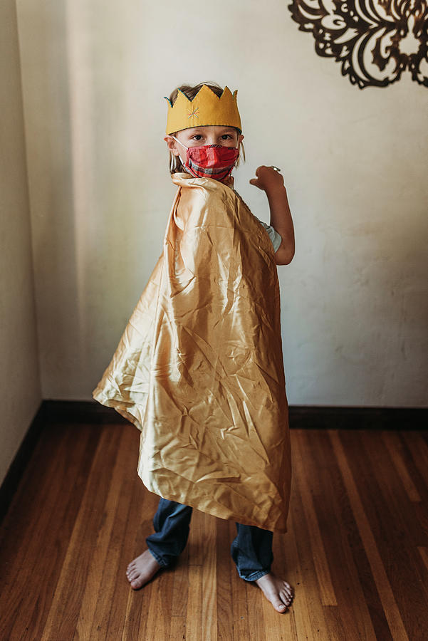 School Aged Young Boy In Dressed As King With Face Mask Photograph by ...