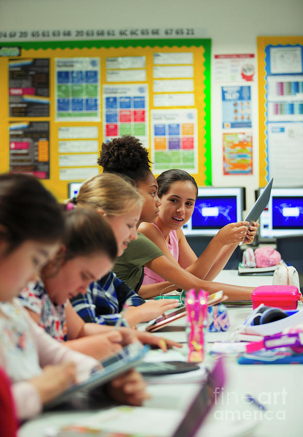 School Student Using Tablets At Desk Photograph by Caia Image/science Photo Library