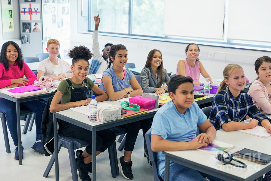 School Students Enjoying Lesson At Desks Photograph by Caia Image ...