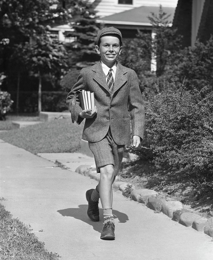 Schoolboy On Sidewalk Photograph by George Marks
