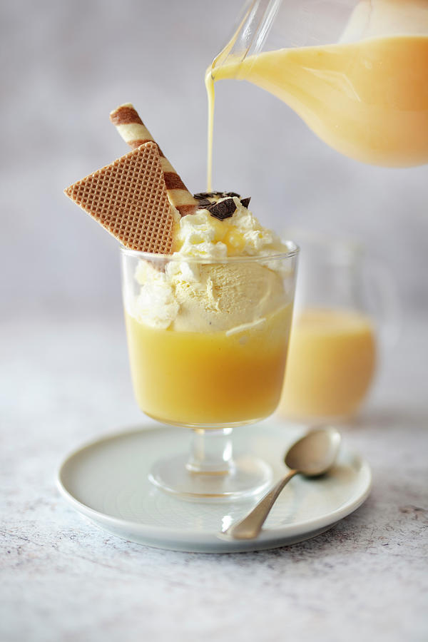Schwedenbecher eastern German Sundae With Vanilla Ice Cream, Applesauce And Eggnog Photograph by Jan Wischnewski