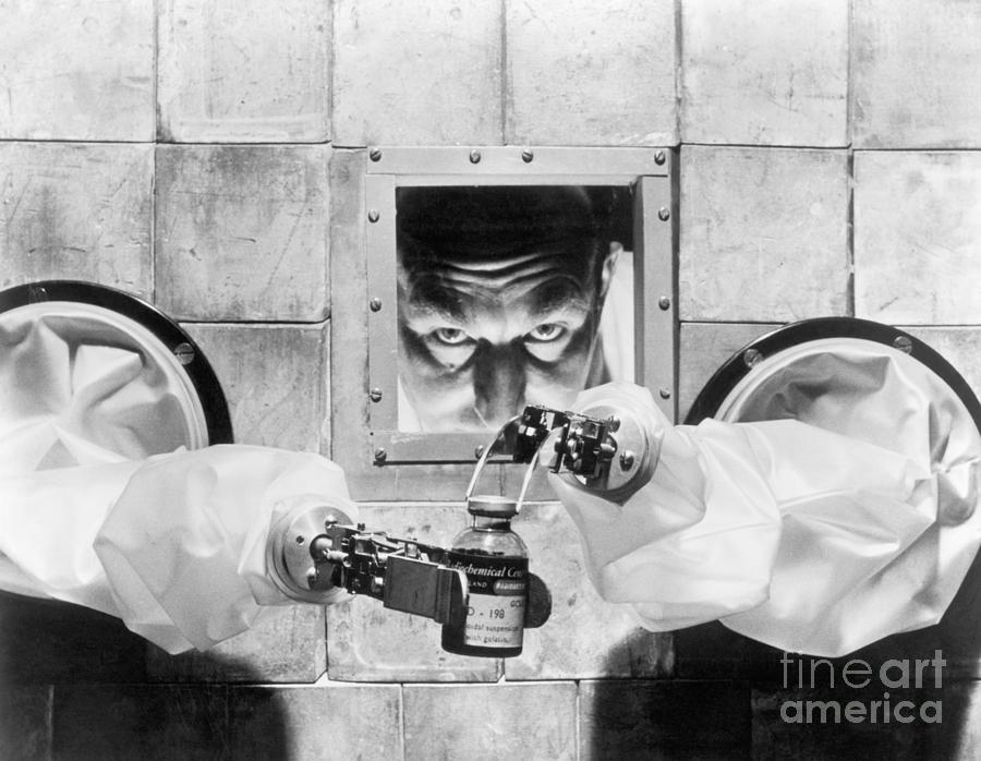 Scientist Bottling Radioactive Isotopes Photograph by Bettmann