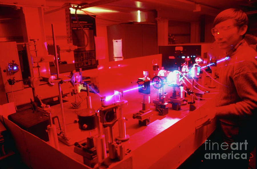 Scientist Observing Beam From Tunable Dye Laser Photograph by Physics Dept., Imperial College/science Photo Library