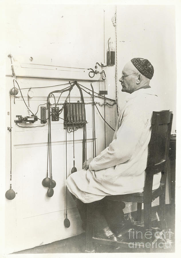 Scientist Observing Recording Instrument Photograph by Bettmann