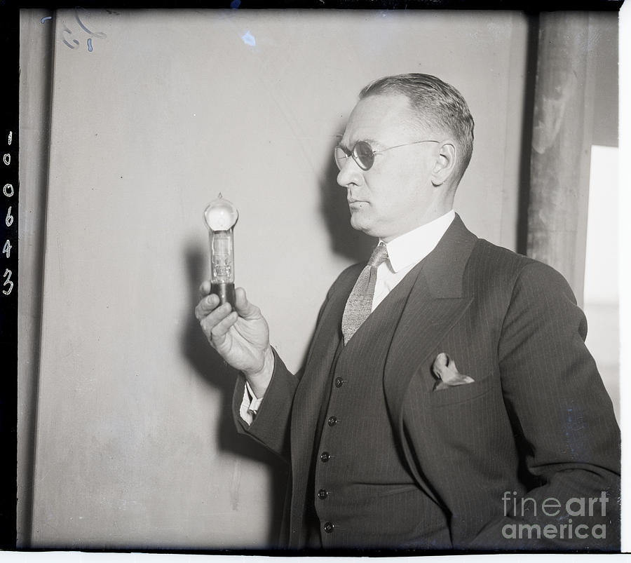 Scientist With Tube Which Controls Photograph by Bettmann