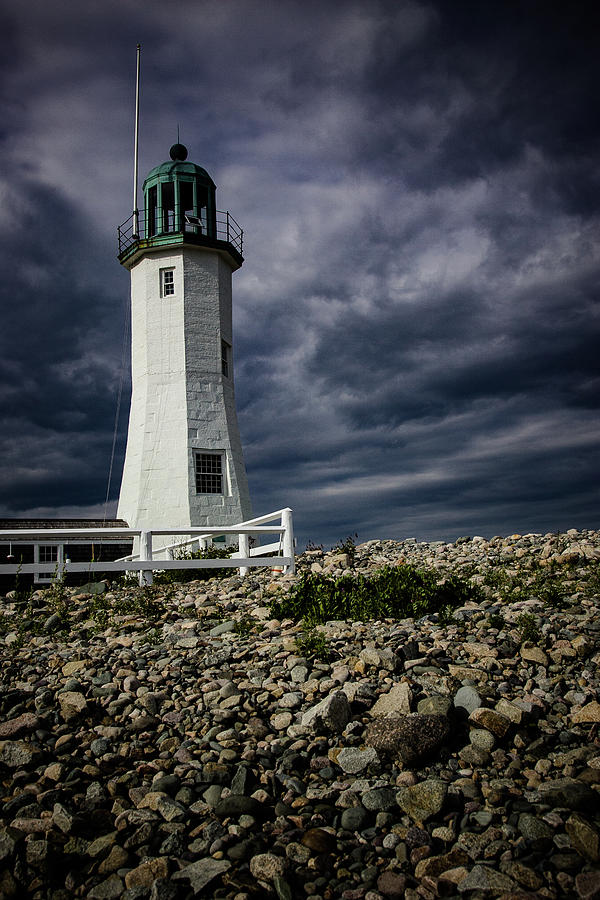 Scituate lighthouse against the stormy sky Photograph by Jeff Folger