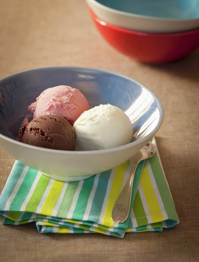 Scoop Of Vanilla, Chocolate And Strawberry Ice Cream Photograph by Hammond