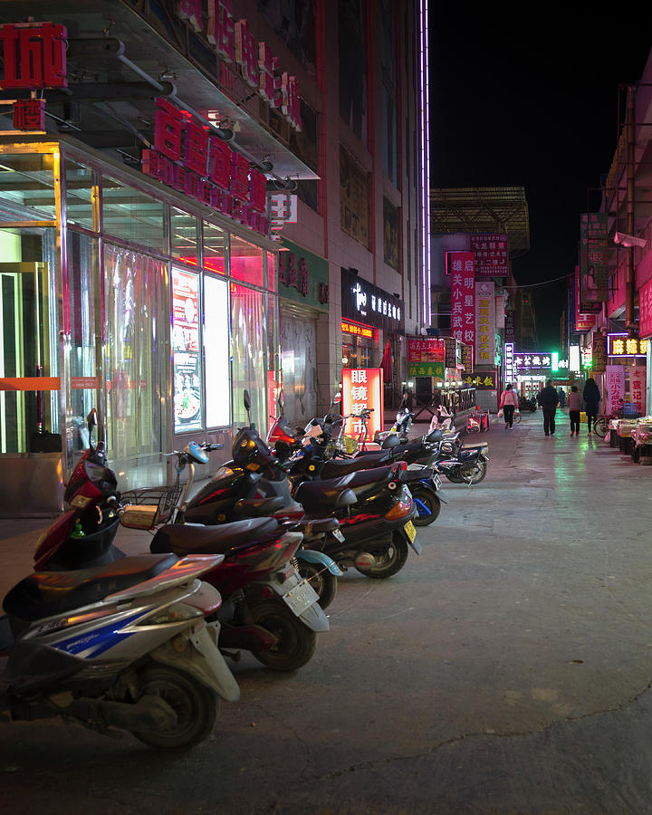Scooter Parking at Night Jiayuguan Gansu China Photograph by Adam Rainoff