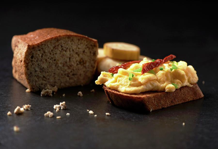 Scrambled Egg With Dried Tomatoes And Chives On Banana Bread paleo Diet Photograph by Hugo Monteros