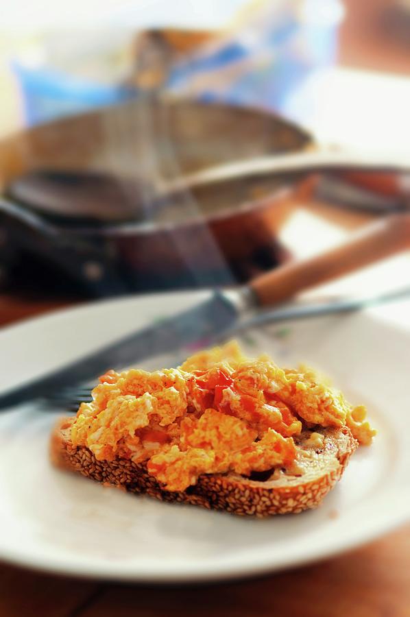 Scrambled Eggs With Tomato On Toast Photograph by Roger Stowell