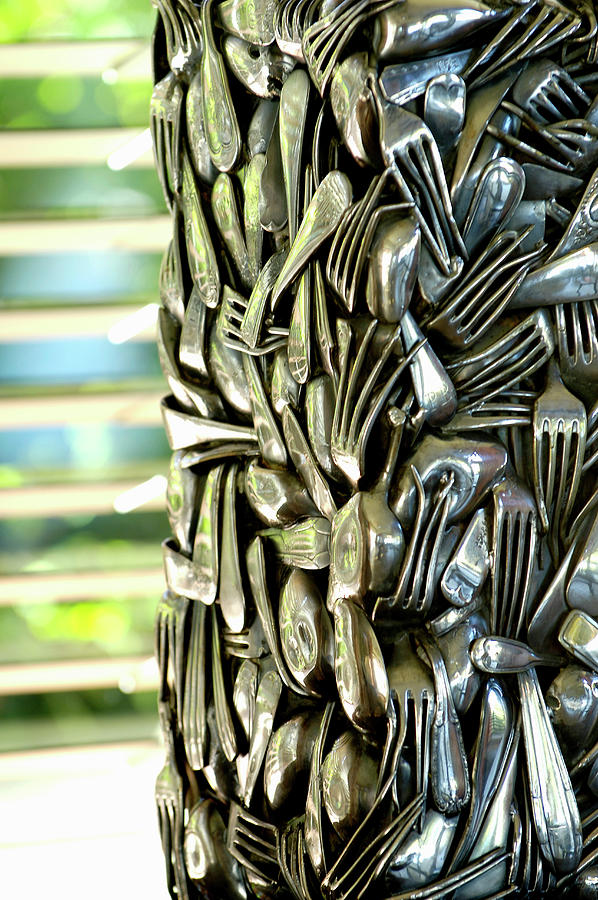 Sculpture Made From Forks And Spoons Pressed Together Photograph by Henri Del Olmo