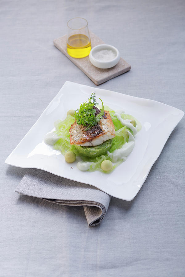 Sea Bass With Avocado And Cucumbers Photograph by Eising Studio