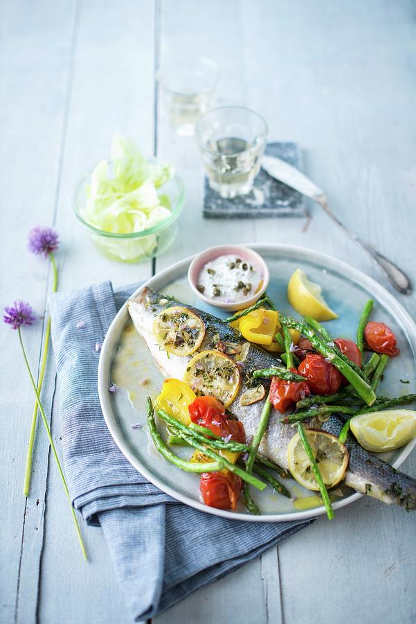 Sea Bass With Lemon And Herbs Grilled Vegetables Cream With Capers Photograph By Thys Fine