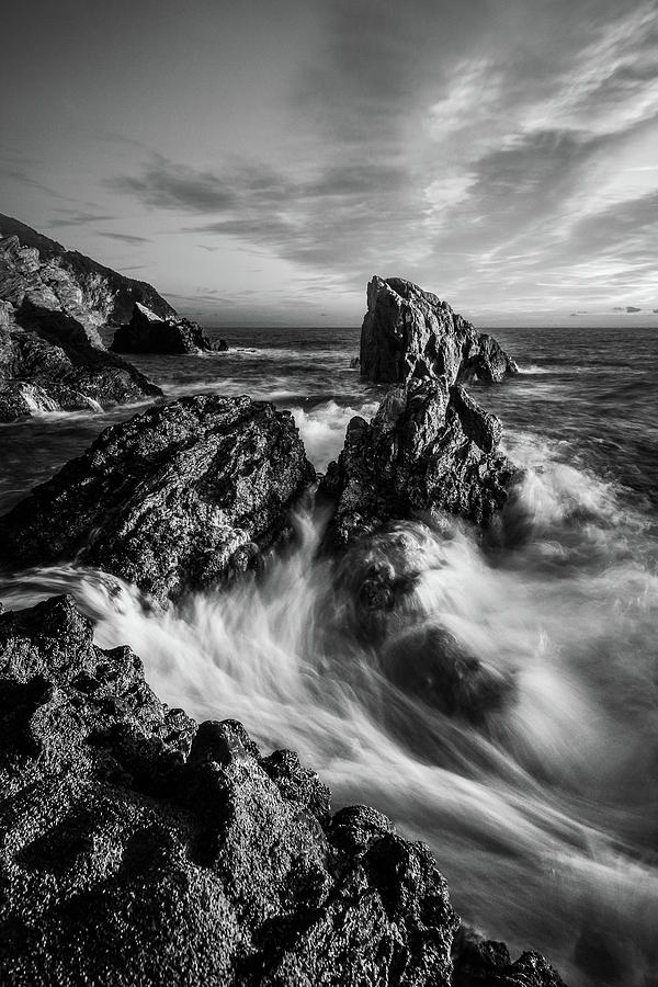 Sea waves flowing on rocks in Manarola, black and white fine art ...