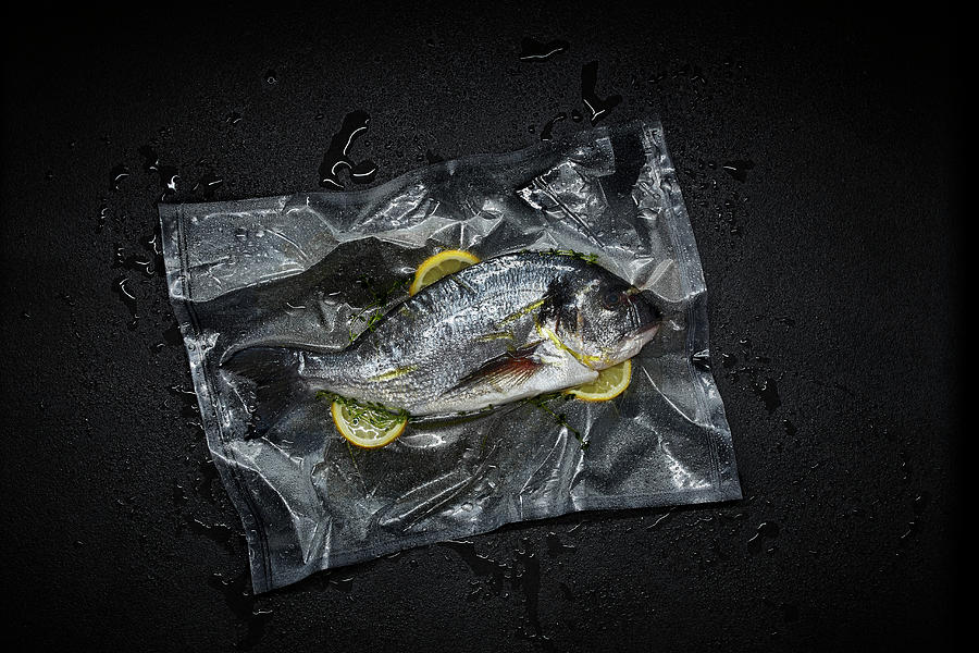 Seabream With Lemon Slices In A Sous Vide Bag Photograph by Maximilian Carlo Schmidt