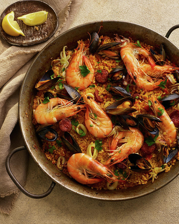 Seafood Paella With King Prawns, Chorizo, Mussels And Squid Photograph by James Lee