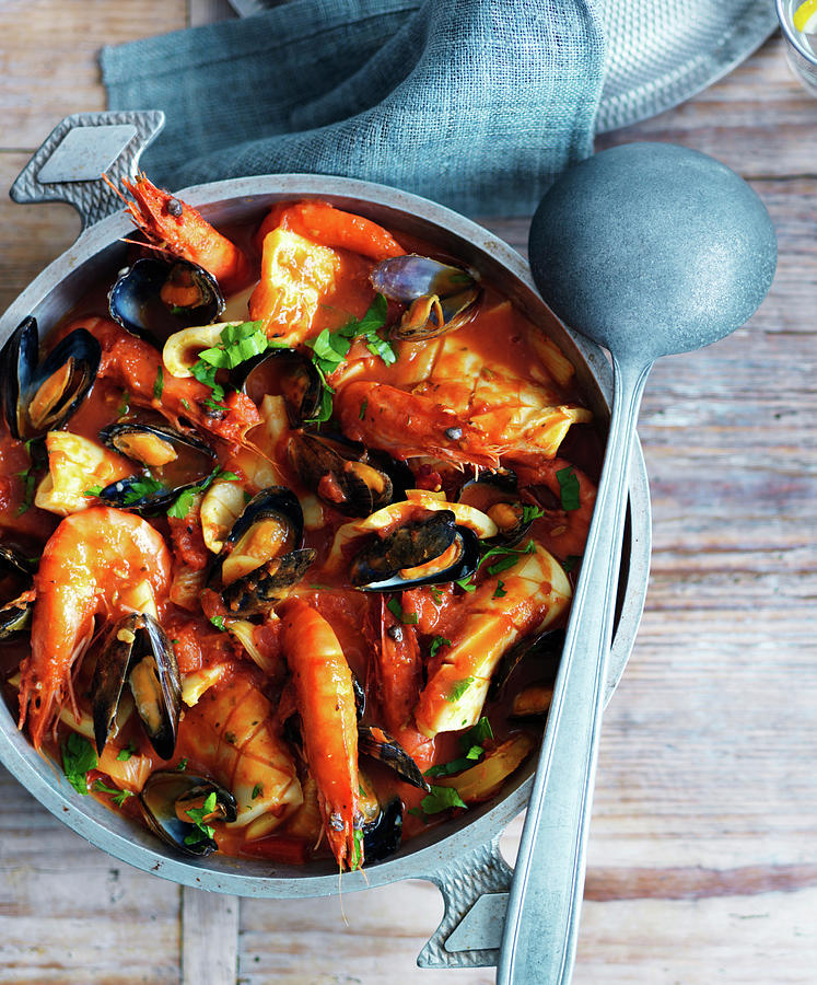 Seafood Stew With King Prawns And Clams Photograph by Karen Thomas