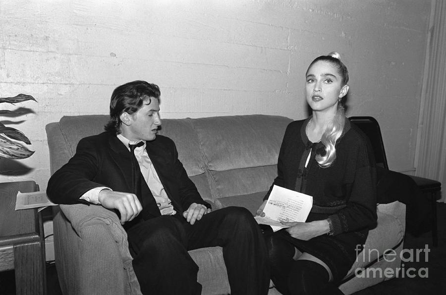 Sean Penn Photograph - Sean Penn And Madonna Sitting On Couch by Bettmann