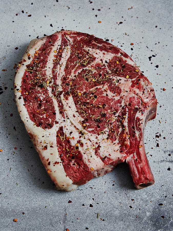 Seasoned Beef Steak With Bone In Photograph by Ali Sid
