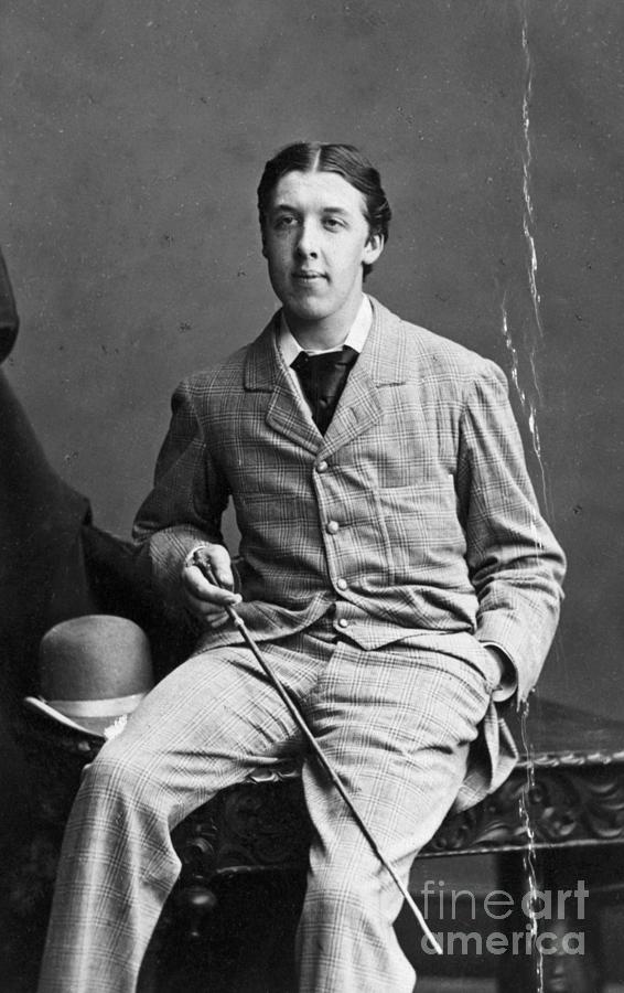 Seated Portrait Of Writer Oscar Wilde Photograph by Bettmann