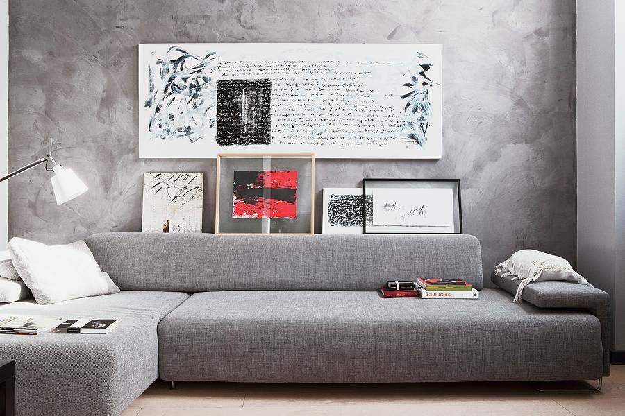 Seating Area In Harmonious Shades Of Grey With Chaise Sofa And Calligraphy On Marbled Wall Photograph by Fabio Lombrici