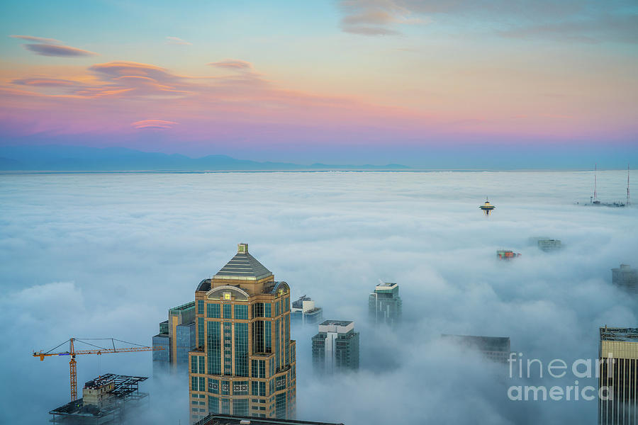 Seattle Emerges from the Clouds at Dawn Photograph by Mike Reid