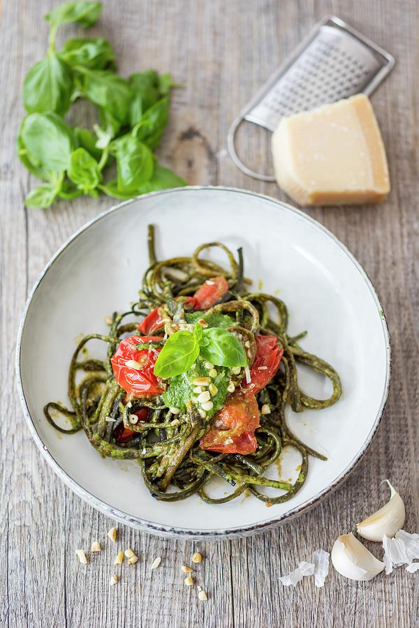 Seaweed Pasta With Basil Pesto And Tomatoes Photograph by Jan Wischnewski