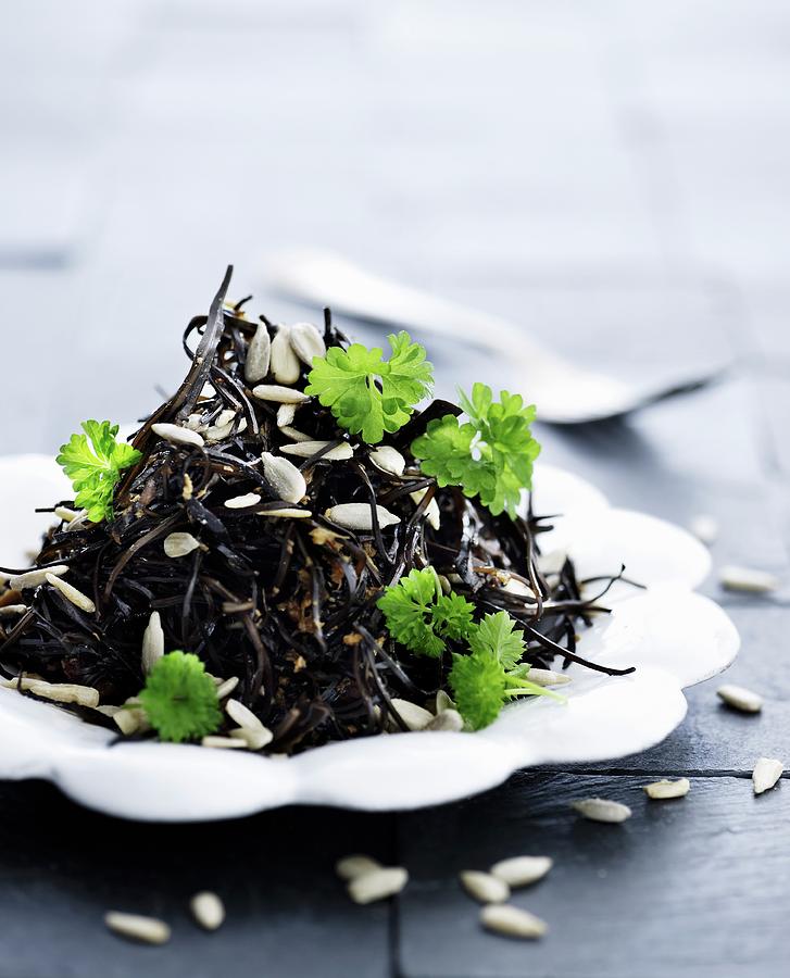 Seaweed Salad With Parsley And Sunflower Seeds Photograph by Mikkel Adsbl