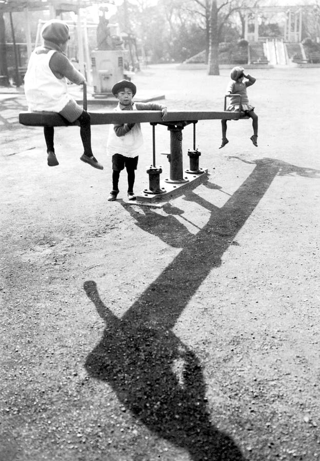 See-saw Shadow Photograph by Fox Photos