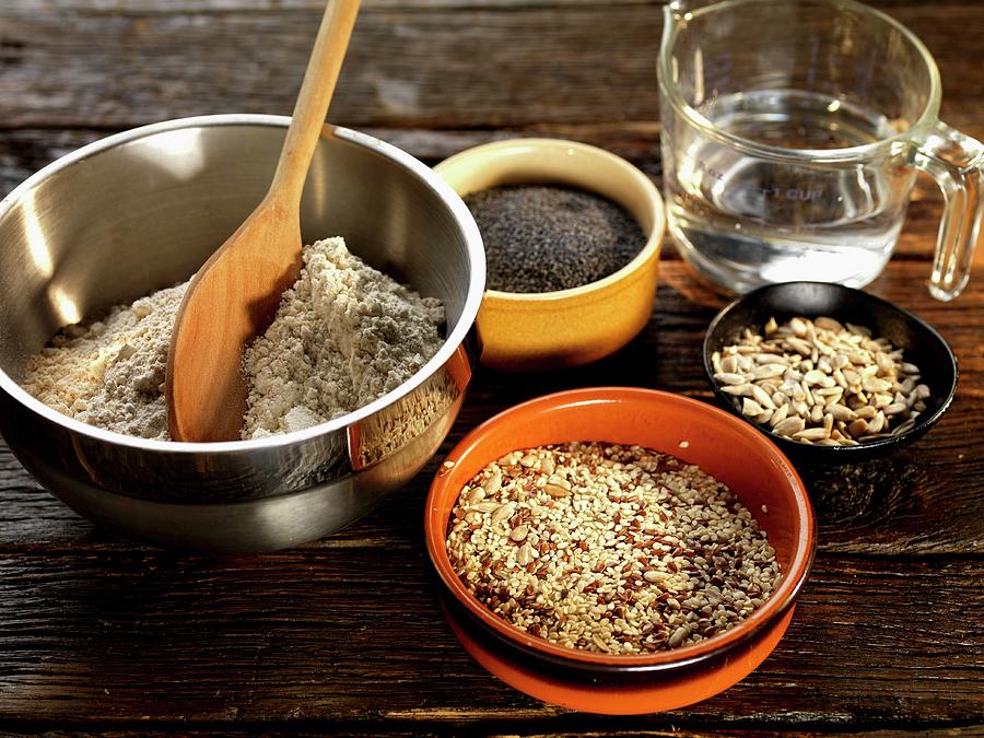 Seeded Bread Ingredients, Whole Grain Flour, Poppy Seeds, Sunflower Seeds, Linseed, Sesame Seeds Photograph by Robert Morris
