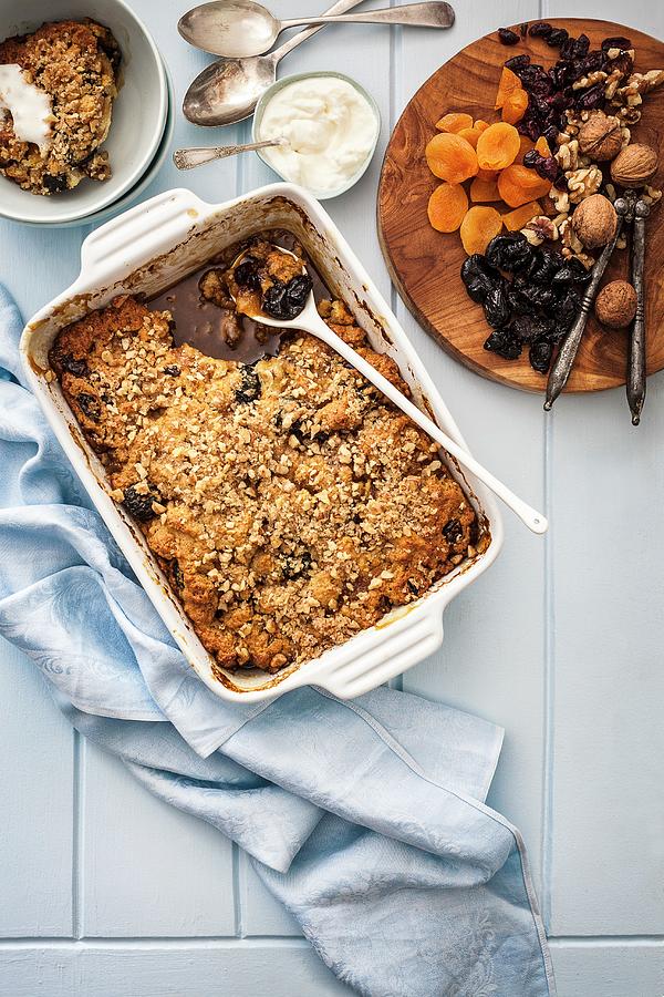 Self-saucing Pudding With Dried Fruits And Nuts Photograph by The Food Union