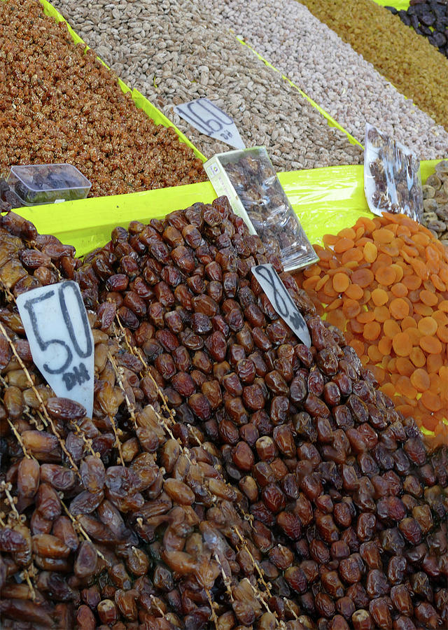 Selling dates, figs and nuts on the Djemma el Fna by Steve Estvanik Selling dates, figs and nuts on the Djemma el Fna by Steve Estvanik