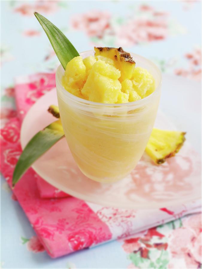 Semi-frozen Dessert With Pineapple And Apricots Photograph by Garlick, Ian