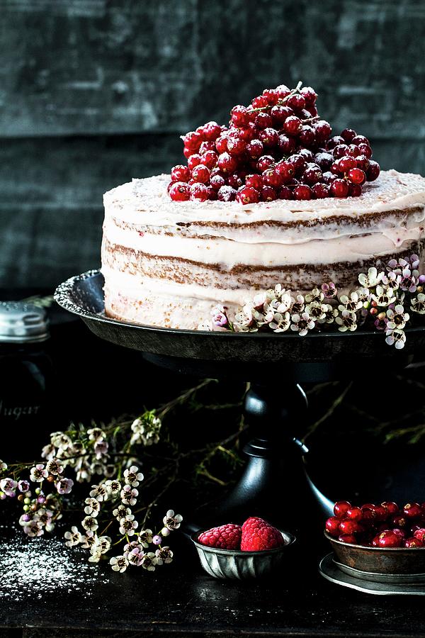 Semi-naked Cake With Currants And Raspberries Photograph by Dees Kche