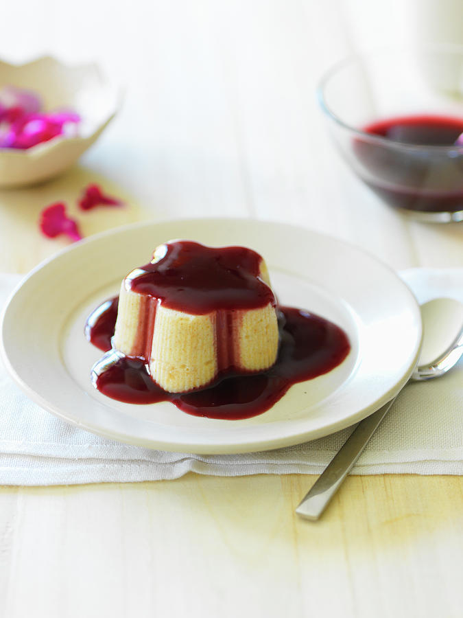 Semolina Pudding With A Red Wine Sauce Photograph by Andreas Thumm