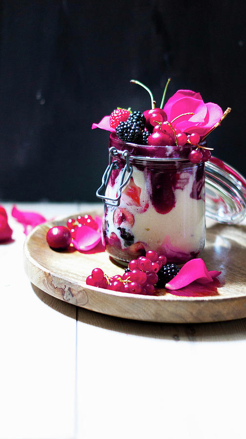 Semolina Pudding With Jam, Berries And Rose Petals In A Flip-top Jar Photograph by Elena Ecimovic