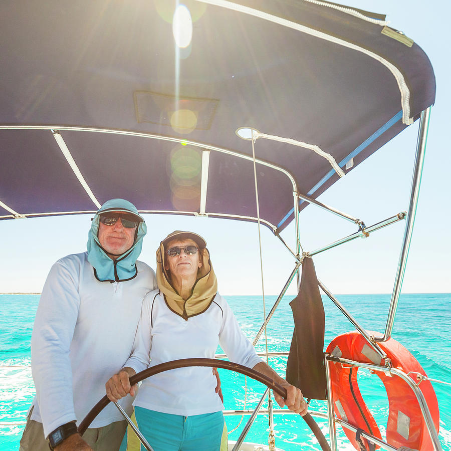 Portrait Photograph - Senior Couple On Sailboat by Christopher Kimmel
