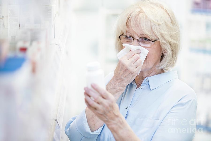 Allergy Photograph - Senior Woman In Pharmacy by Science Photo Library