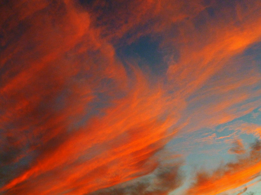 September Clouds at Sunset Photograph by Mike McBrayer