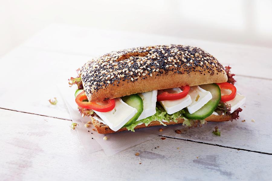 Sesame And Poppy Seed Roll With Camembert, Vegetables And Lettuce Photograph by Thorsten Kleine Holthaus