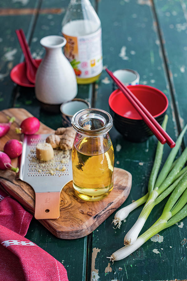 Sesame Oil, Ginger And Vegetables Photograph by Great Stock!