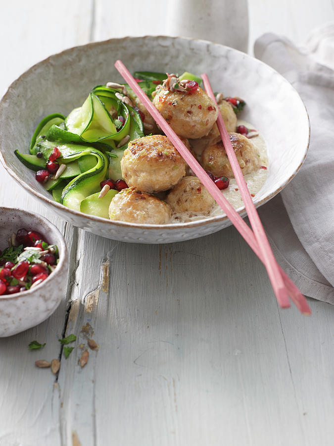 Sesame Poultry Dumplings With Zucchini Noodles Photograph by Jan-peter Westermann / Stockfood Studios