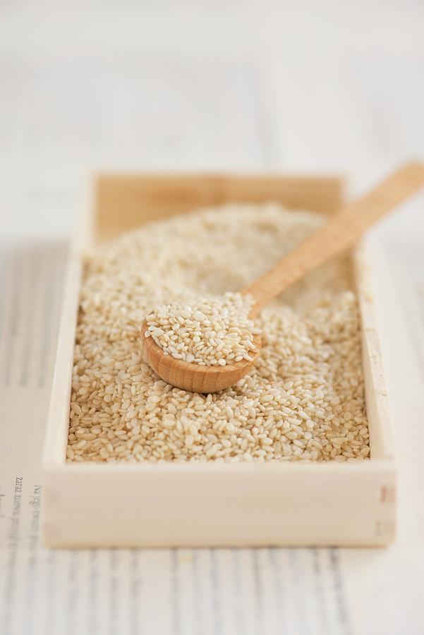Sesame Seeds With A Spoon In A Wooden Box Photograph by Ewa Rejmer