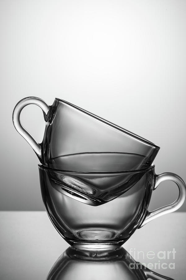 Set Of Two Glass Cups Against Gray Photograph by Valeriy Bochkarev / 500px