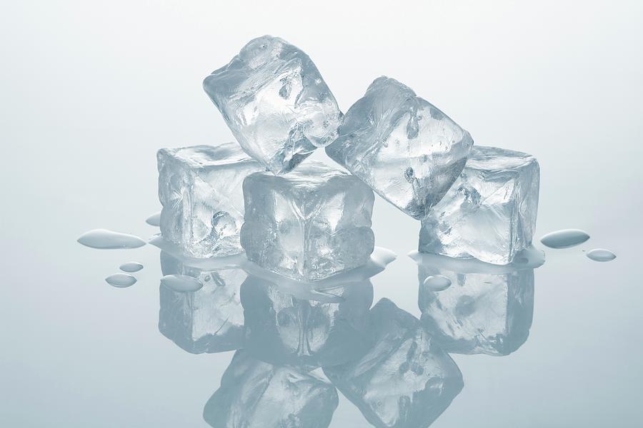 Several Ice Cubes Photograph by Krger & Gross