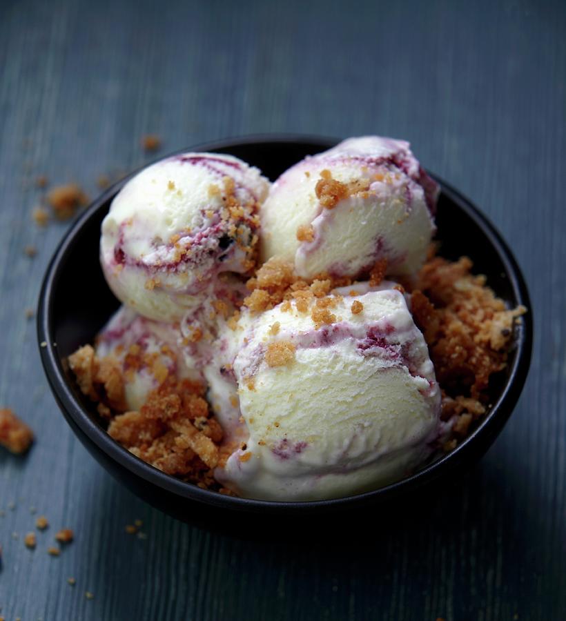 Several Scoops Of Blackberry And Blueberry Ice Cream Sprinkled With Crumble Photograph by Zemgalietis, Maris